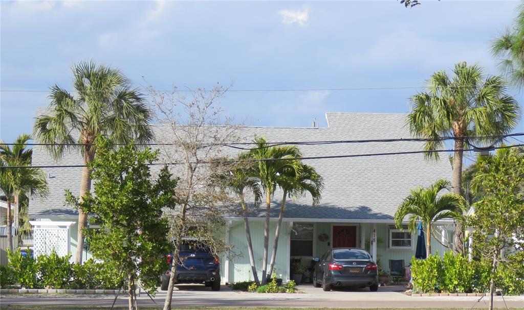 418 Narvaezi Street Venice, FL 34285 - Photo 1 of 67 a view of a building with a street