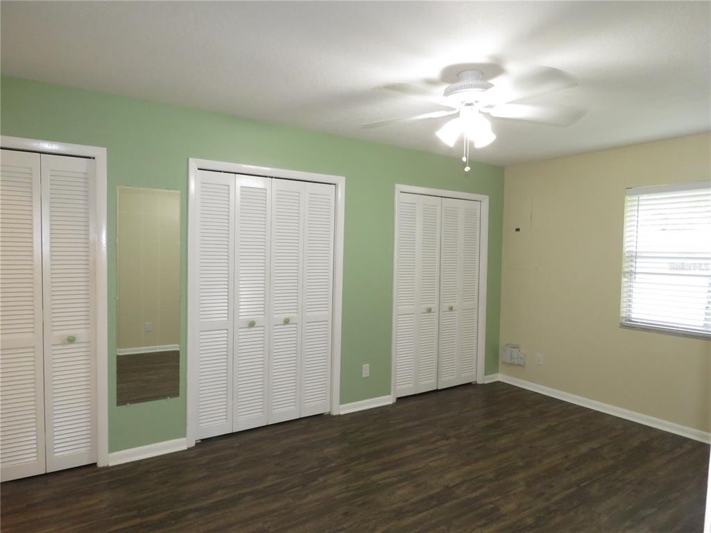 418 Narvaezi Street Venice, FL 34285 - Photo 14 of 67 a view of a livingroom with a chandelier fan