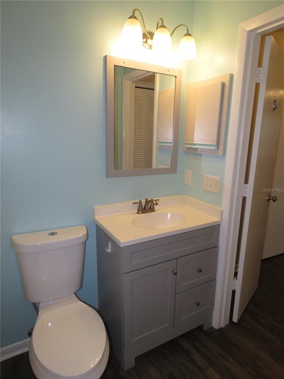 418 Narvaezi Street Venice, FL 34285 - Photo 21 of 67 a bathroom with a toilet sink and mirror