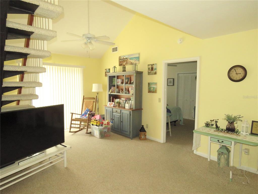 418 Narvaezi Street Venice, FL 34285 - Photo 29 of 67 a view of a livingroom with furniture and a flat screen tv
