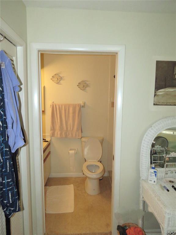 418 Narvaezi Street Venice, FL 34285 - Photo 32 of 67 a bathroom with a toilet sink and shower