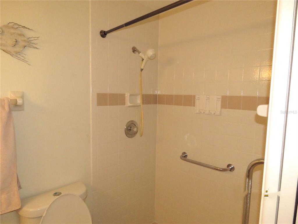 418 Narvaezi Street Venice, FL 34285 - Photo 34 of 67 a bathroom with a toilet and shower
