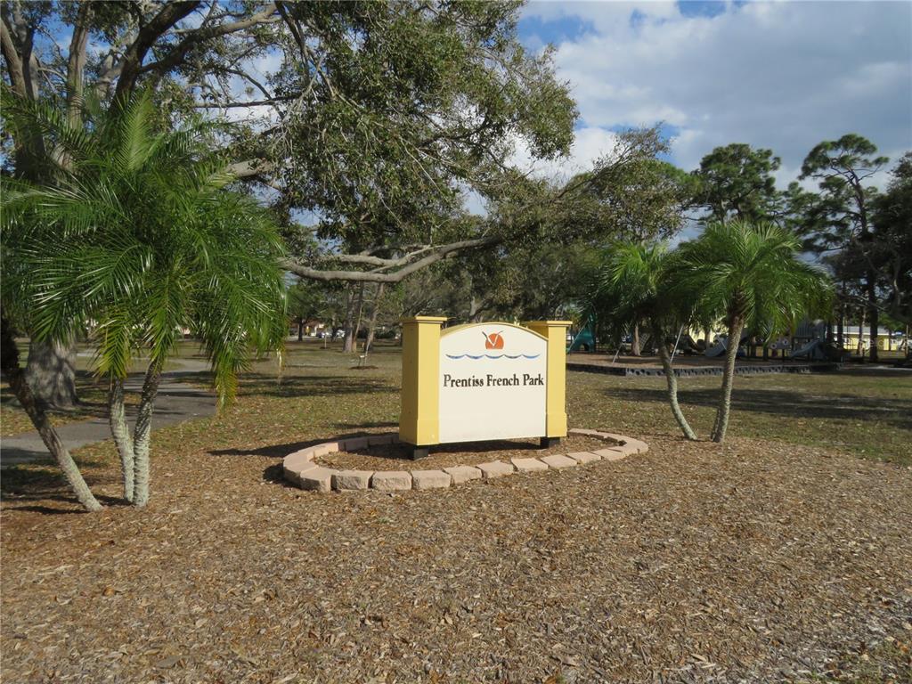 418 Narvaezi Street Venice, FL 34285 - Photo 41 of 67 a sign board with a yard