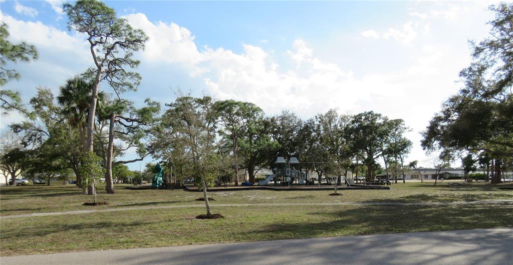 418 Narvaezi Street Venice, FL 34285 - Photo 42 of 67 a park with lots of trees and buildings