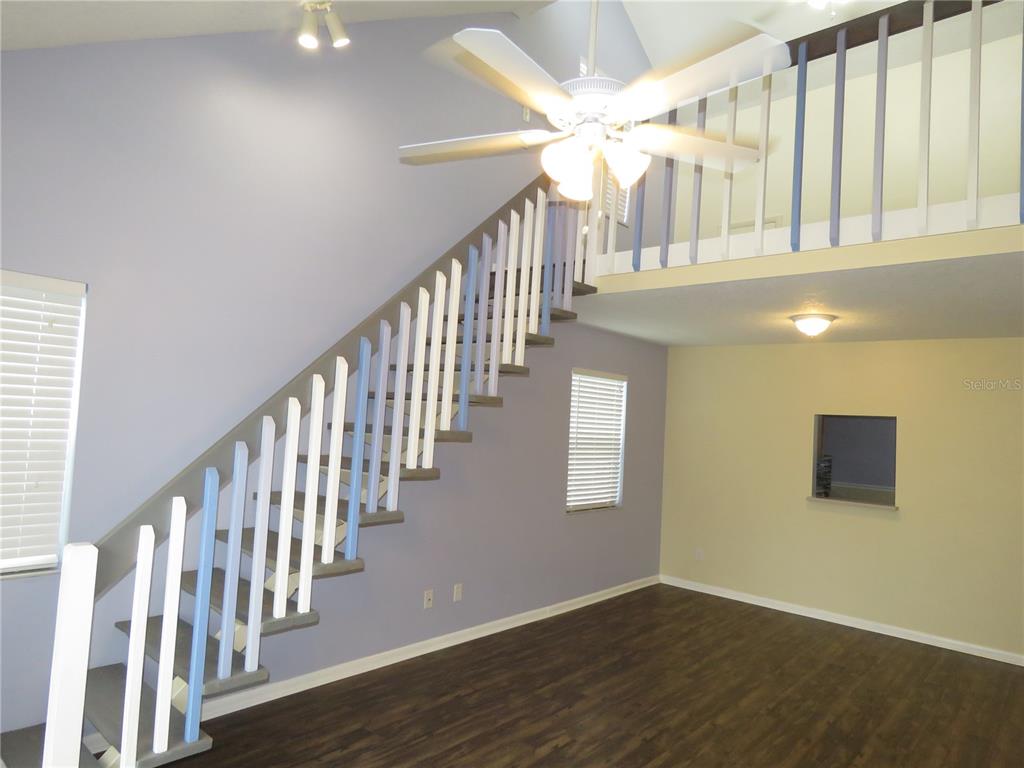 418 Narvaezi Street Venice, FL 34285 - Photo 10 of 67 a view of an entryway with wooden floor