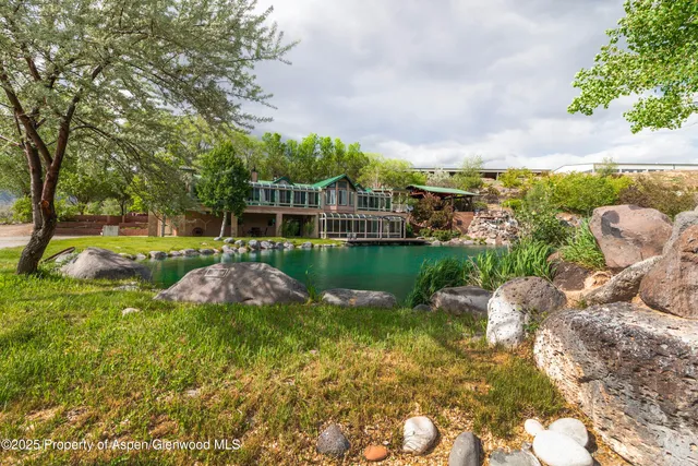 a view of a lake with a building in the background