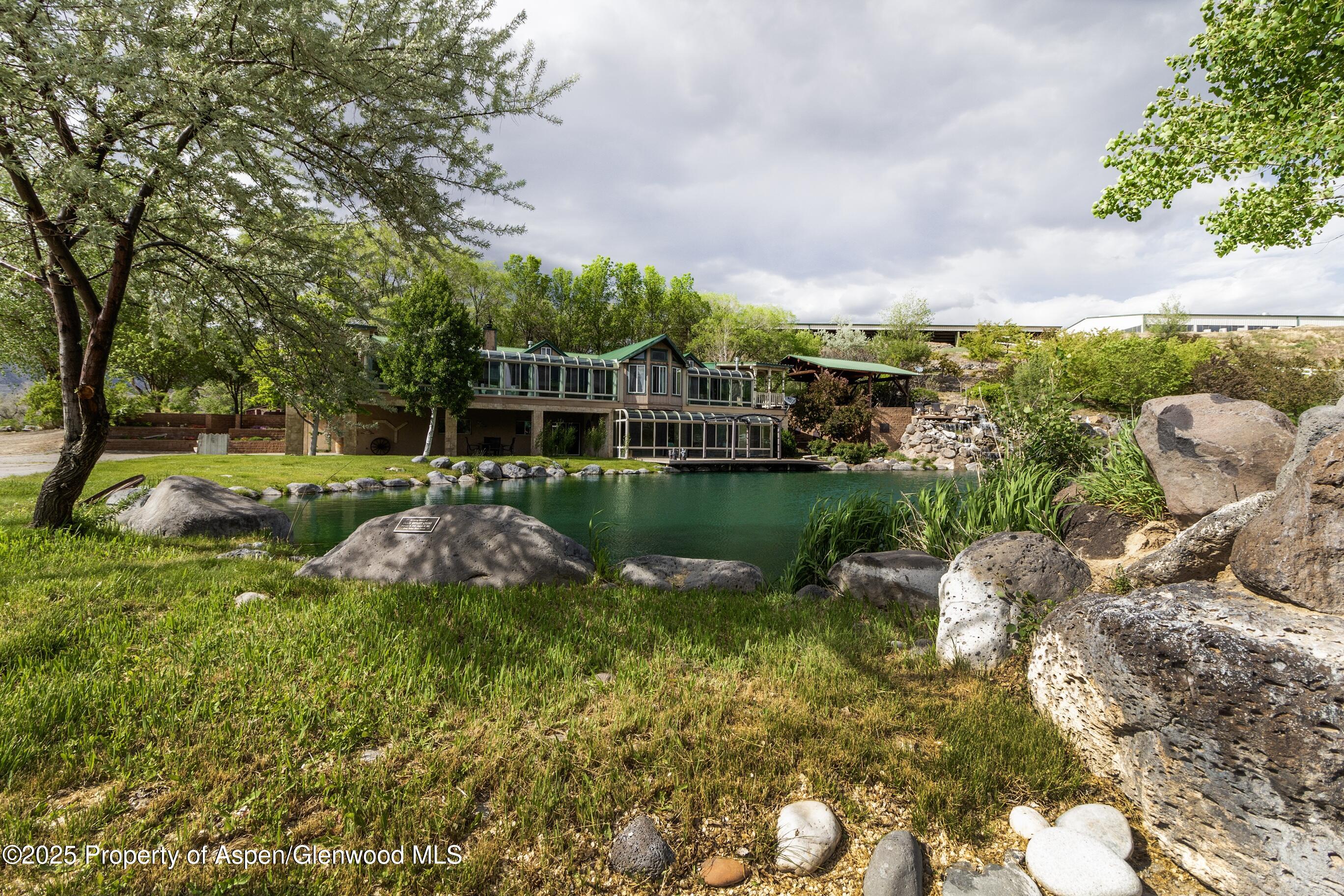 a view of a lake with a building in the background