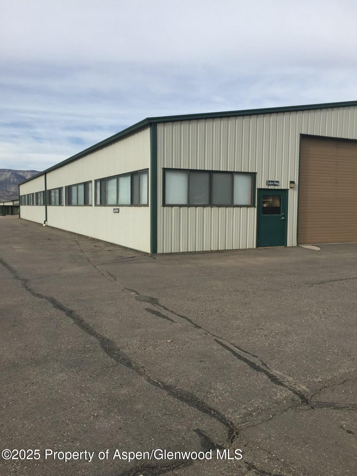 8700 County Road 300 Parachute, CO 81635 - Photo 116 of 201 a view of an empty room with a window