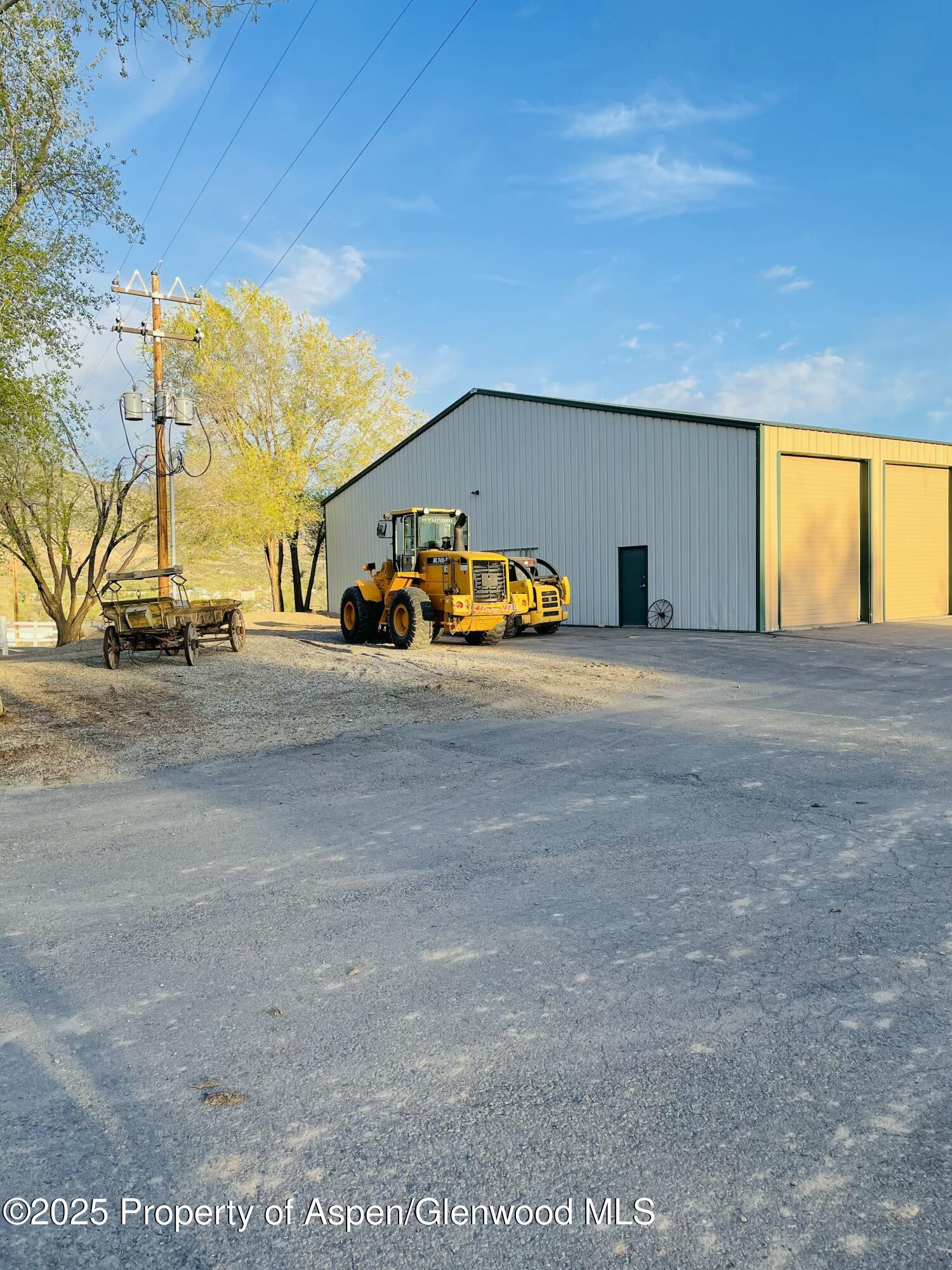 8700 County Road 300 Parachute, CO 81635 - Photo 124 of 201 a view of car parked on the side of the road