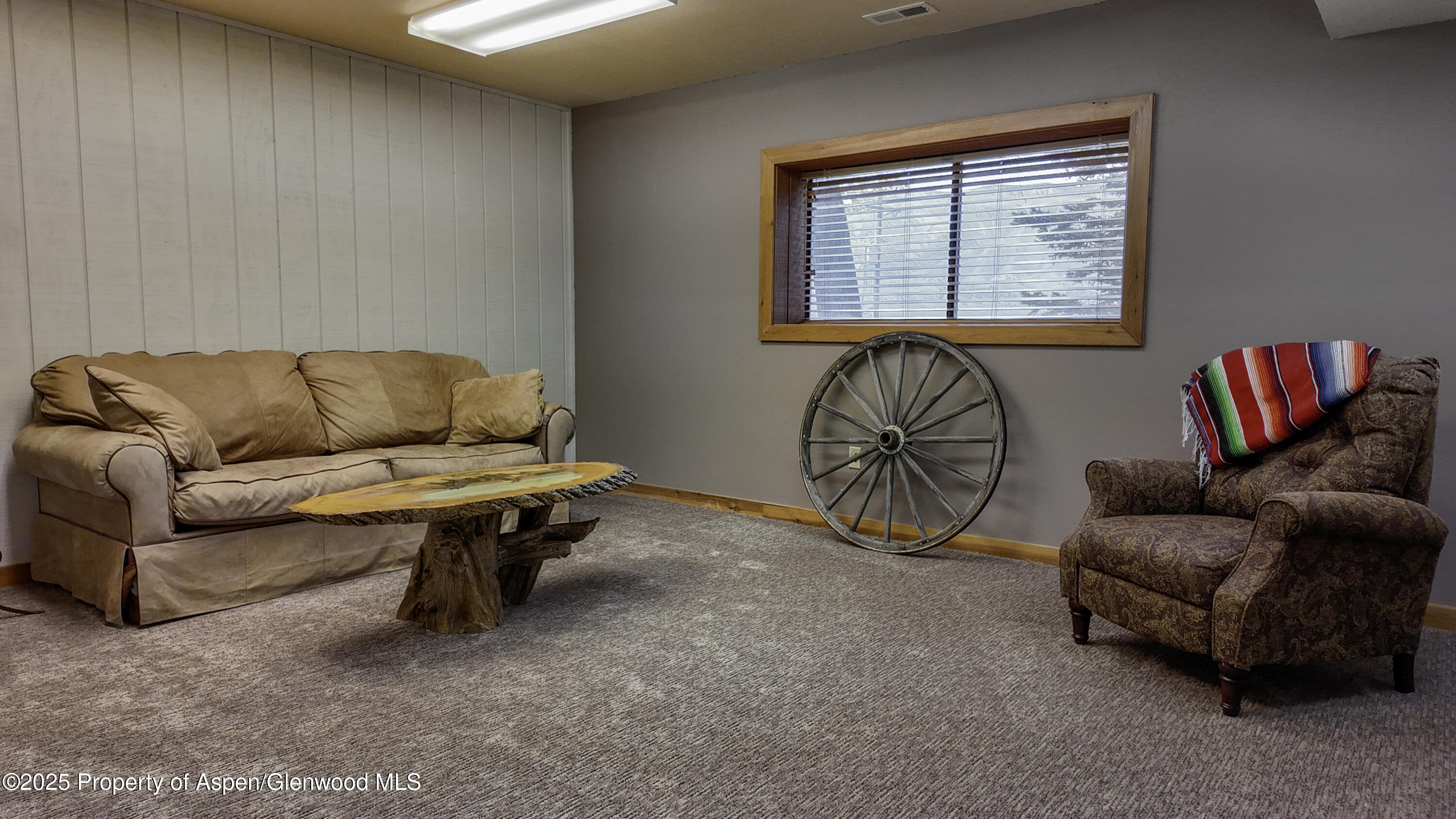 8700 County Road 300 Parachute, CO 81635 - Photo 163 of 201 a living room with furniture and a window