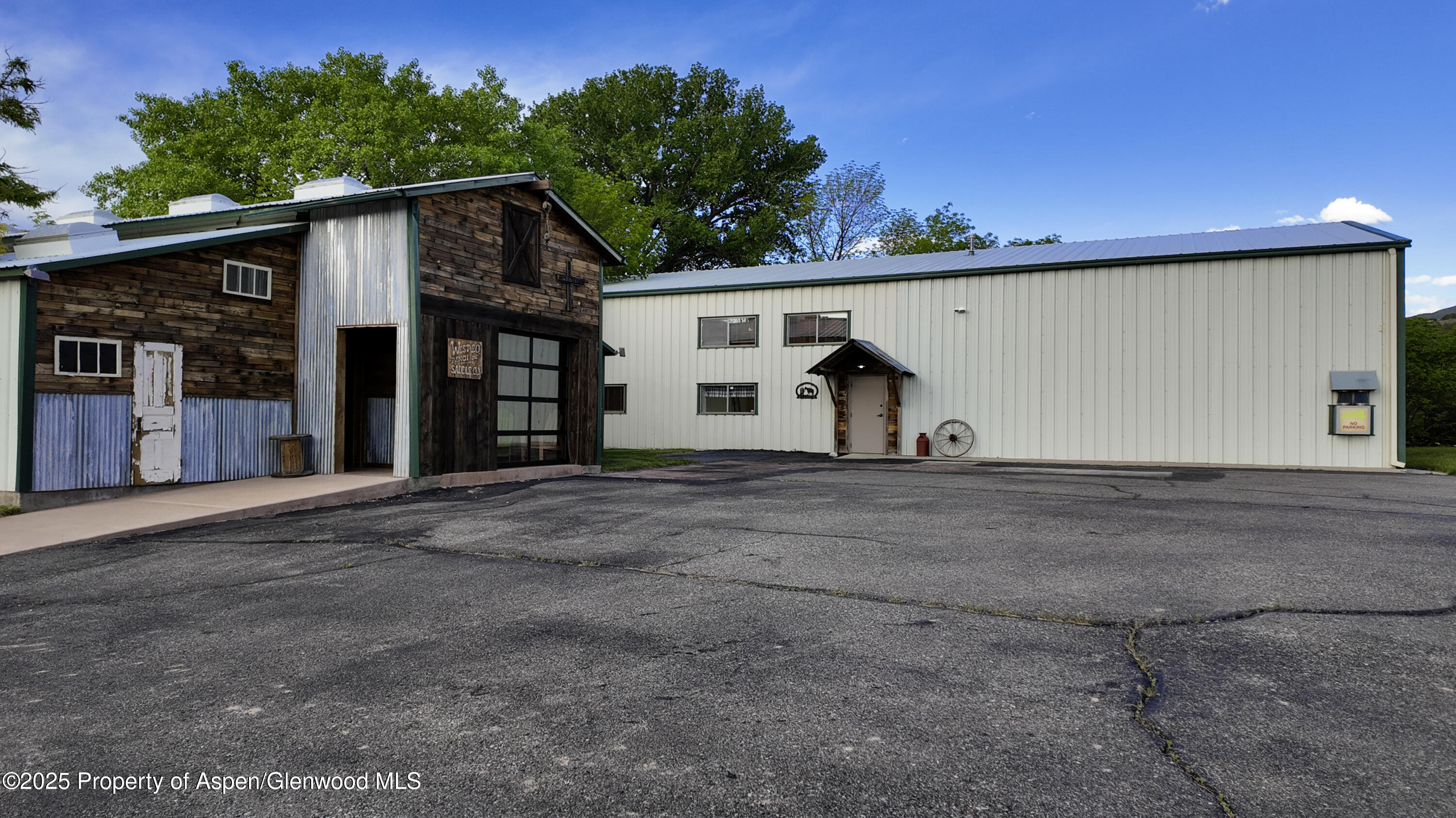 8700 County Road 300 Parachute, CO 81635 - Photo 187 of 201 a view of a house with a yard