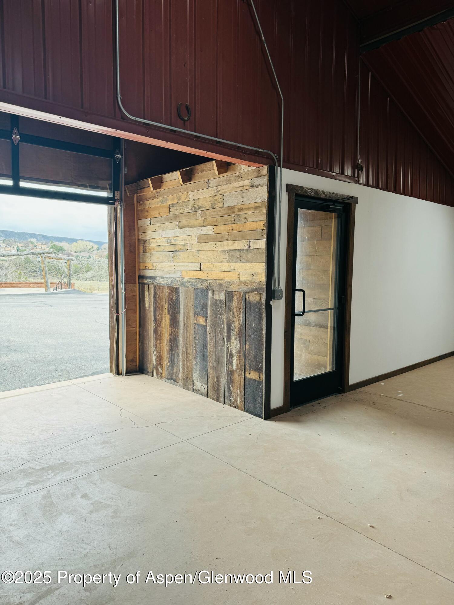8700 County Road 300 Parachute, CO 81635 - Photo 72 of 201 a view of an empty room with a window