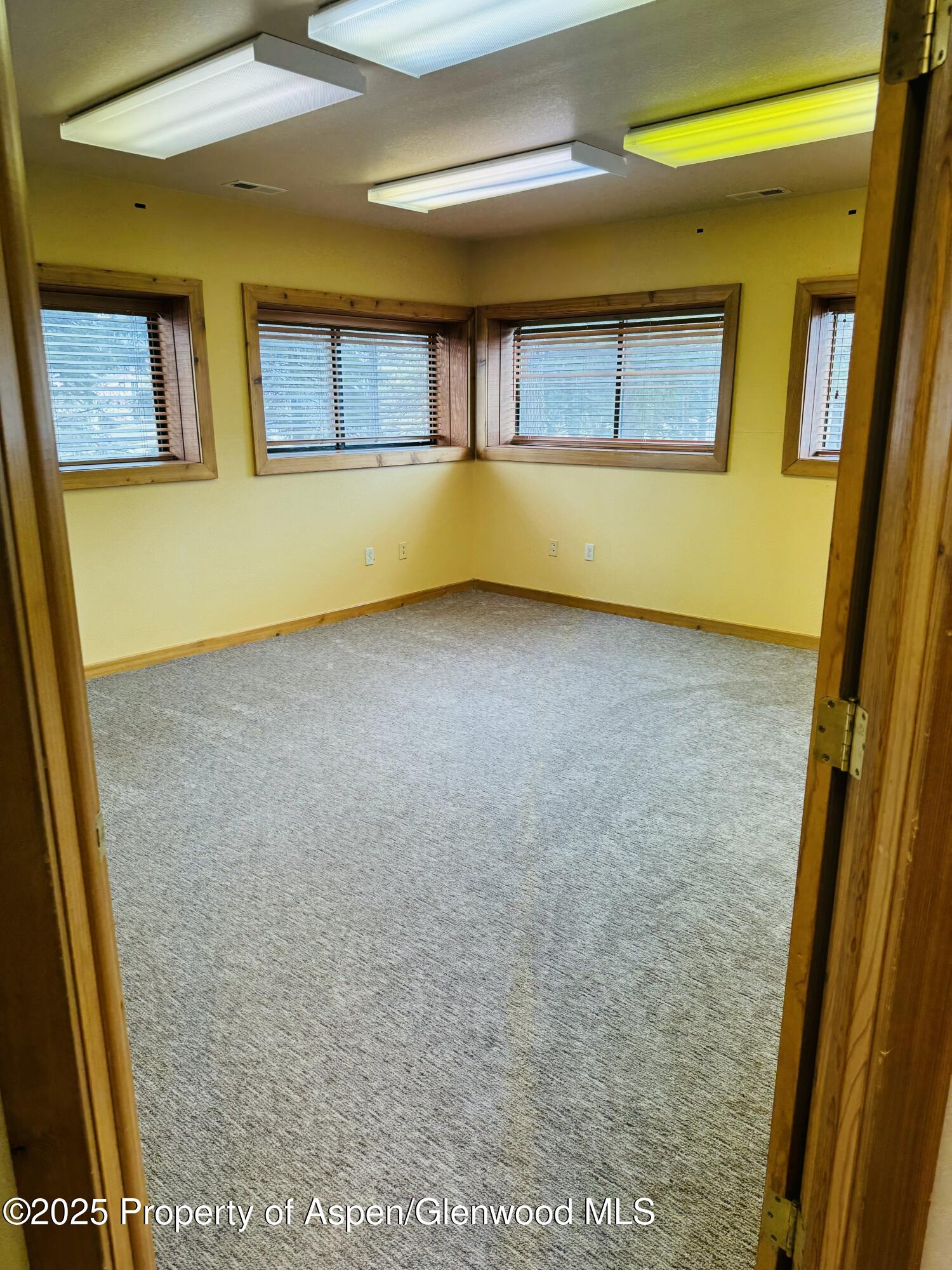 8700 County Road 300 Parachute, CO 81635 - Photo 83 of 201 a view of an empty room with a window