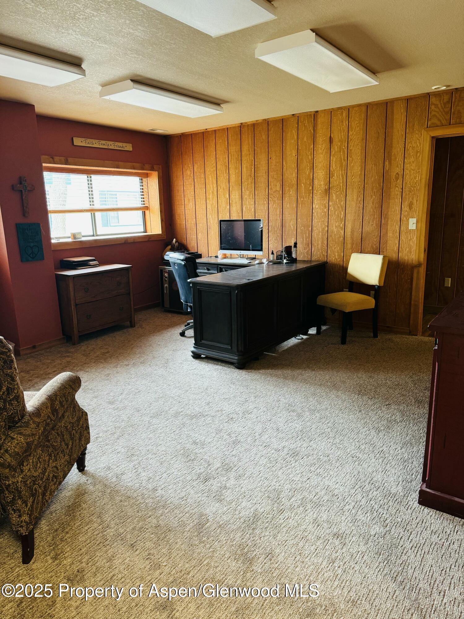 8700 County Road 300 Parachute, CO 81635 - Photo 86 of 201 a living room with furniture and a window