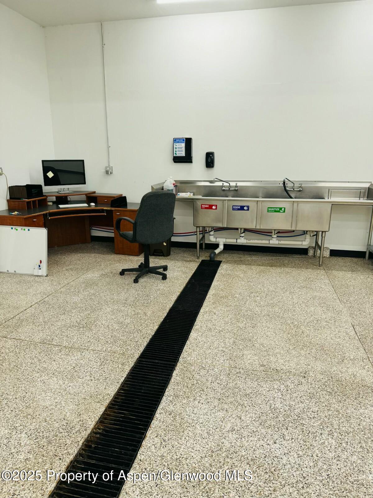 8700 County Road 300 Parachute, CO 81635 - Photo 99 of 201 a view of a workspace with furniture