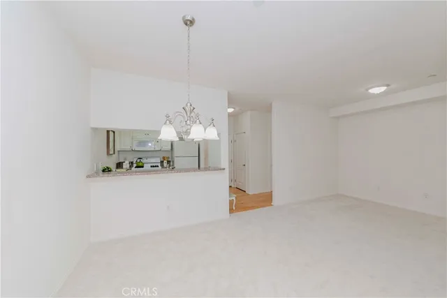 an empty room with mirror