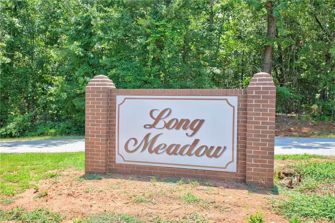223 Maple Drive Anderson, SC 29621 - Photo 43 of 45 A welcoming brick sign marks the entrance to the verdant community of Long Meadow.
