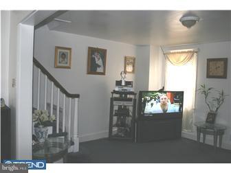246 Heather Road Upper Darby, PA 19082 - Photo 5 of 7 a living room with furniture and a wooden floor