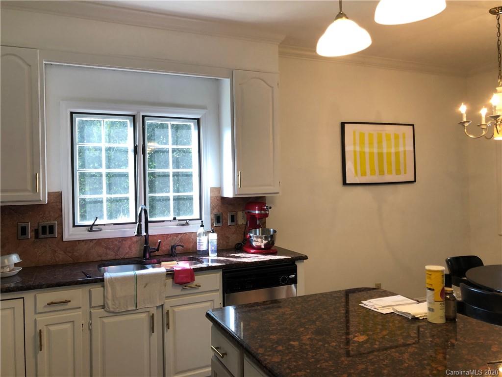 426 St Michaels Way, Unit 15 Fort Mill, SC 29708 - Photo 10 of 25 a kitchen with a sink cabinets and window