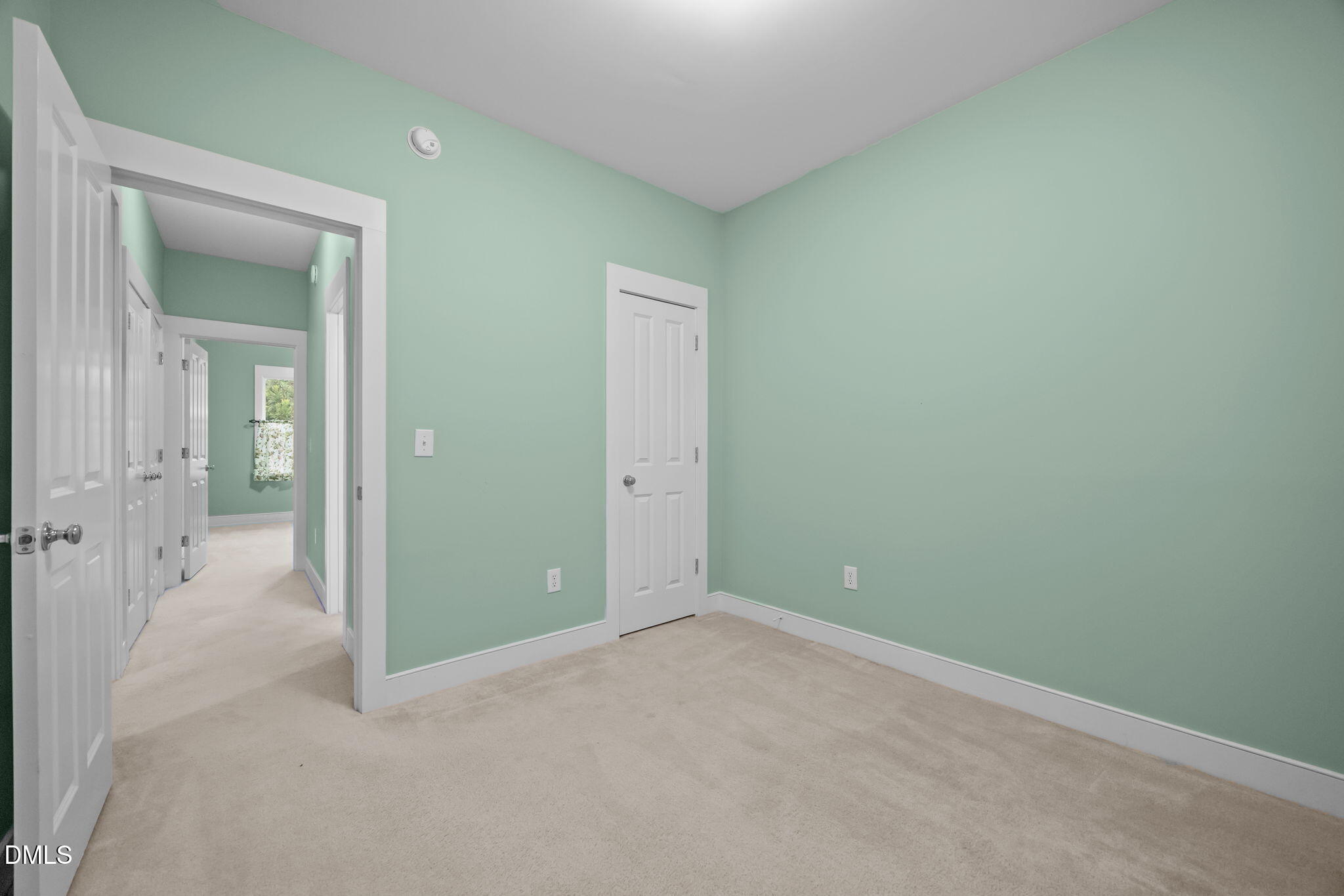 2817 Falls River Avenue Raleigh, NC 27614 - Photo 17 of 60 an empty room with mirror in it