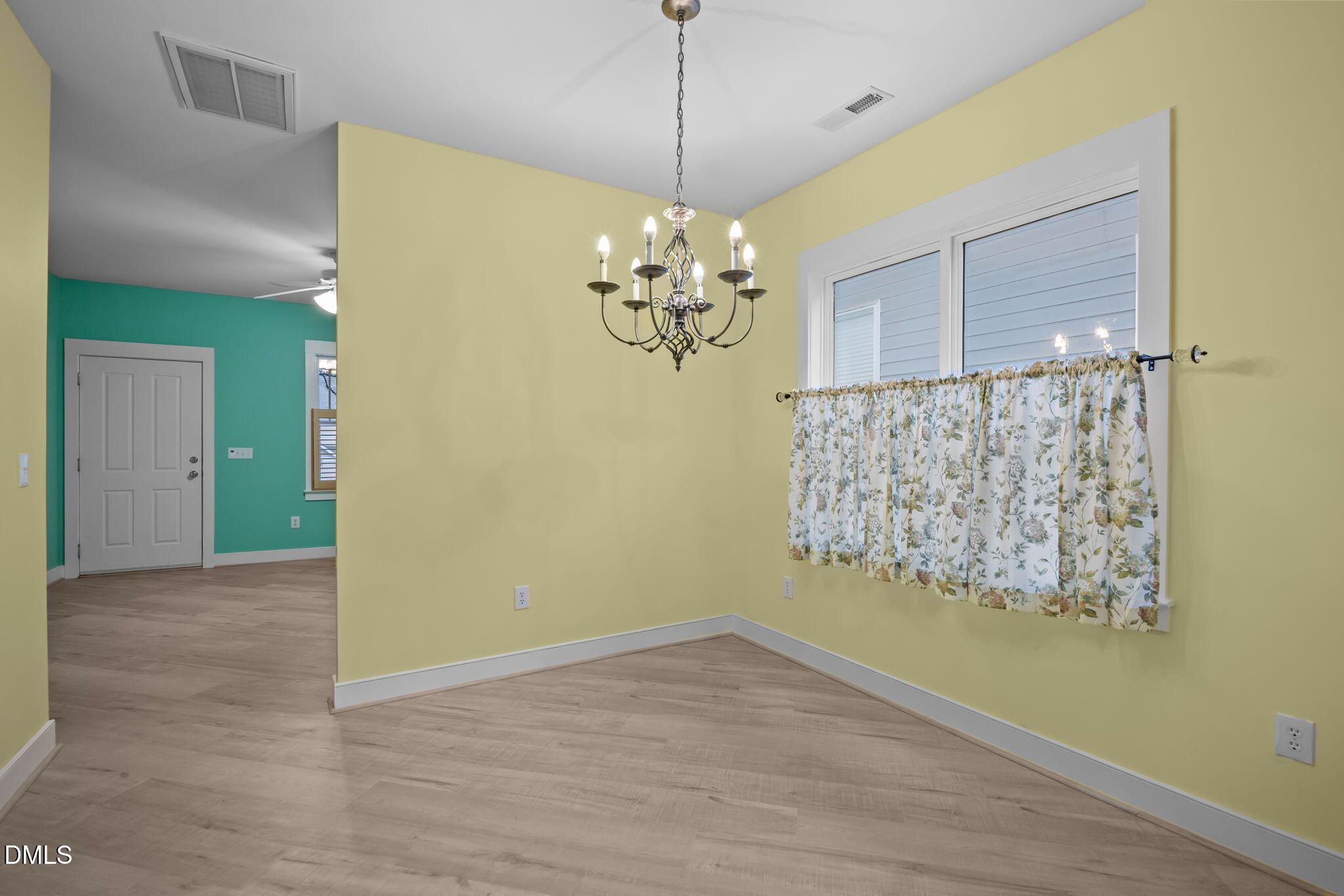 2817 Falls River Avenue Raleigh, NC 27614 - Photo 27 of 60 a view of a chandelier in a room