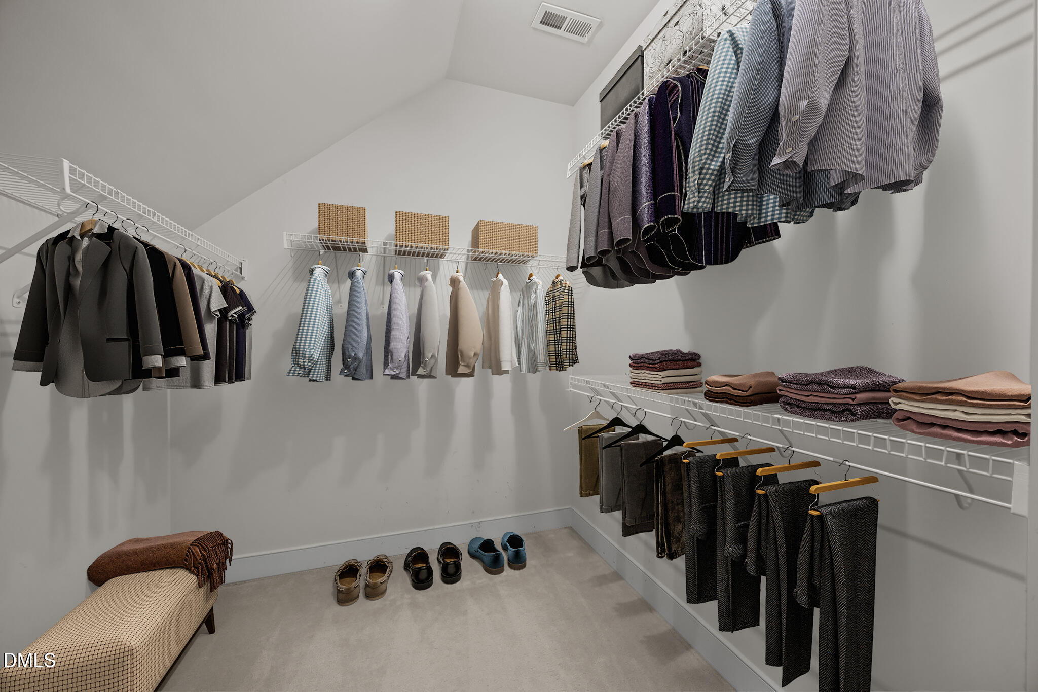 2817 Falls River Avenue Raleigh, NC 27614 - Photo 33 of 60 a view of walk in closet with clothes and shoes