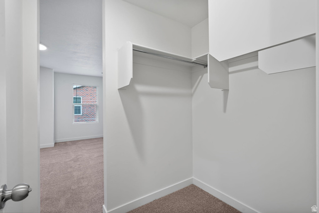 445 950 South Ogden, UT 84404 - Photo 19 of 28 Spacious closet featuring light colored carpet