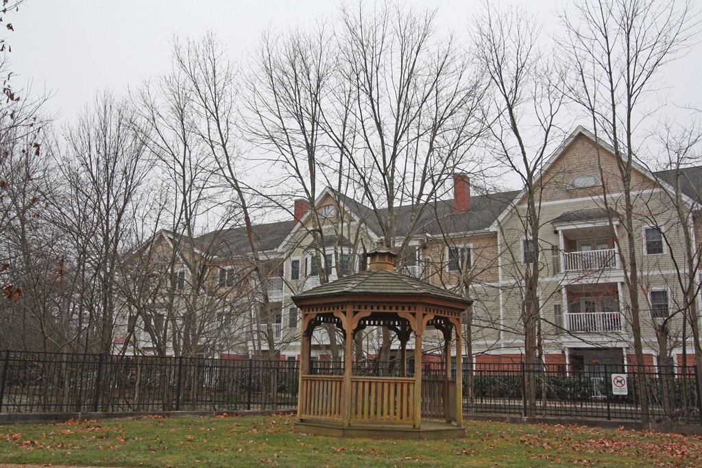 190 Chickering, Unit 210D North Andover, MA 01845 - Photo 1 of 16 a view of a building with a yard