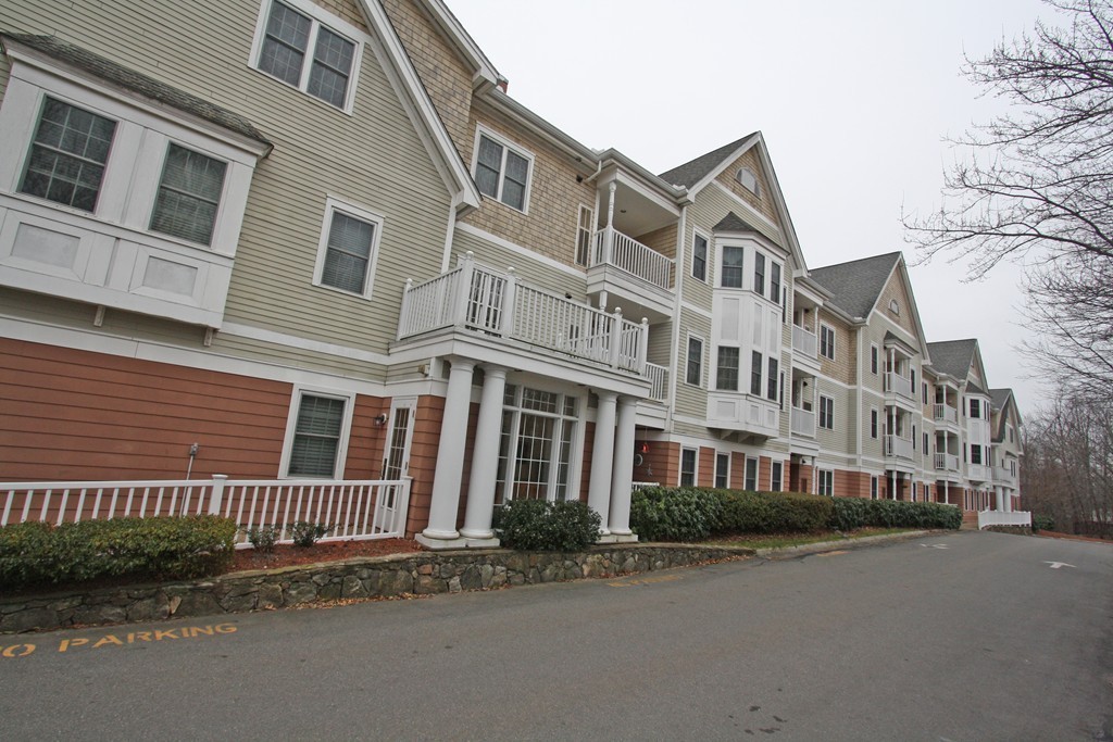 190 Chickering, Unit 210D North Andover, MA 01845 - Photo 14 of 16 a view of a building next to a street