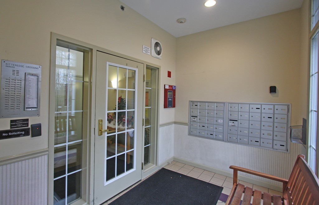 190 Chickering, Unit 210D North Andover, MA 01845 - Photo 15 of 16 a view of staircase with white walls