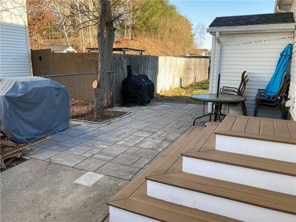 14 Curran Road Cumberland, RI 02864 - Photo 18 of 19 back yard- within enclosed fenced yard area new patio area.