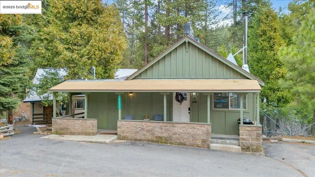 a view of a balcony with furniture