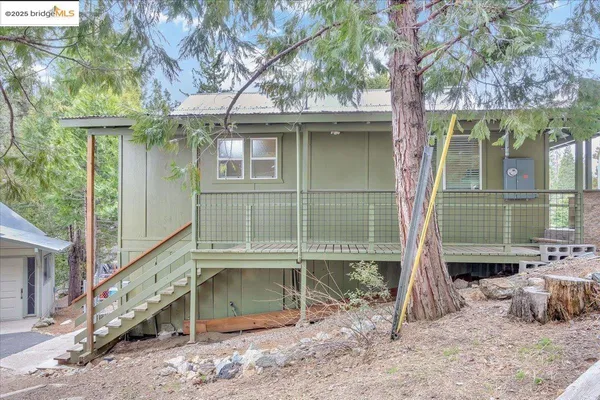 a house view with a backyard space