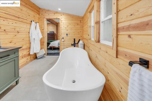 a bathroom with a sink a toilet and bathtub