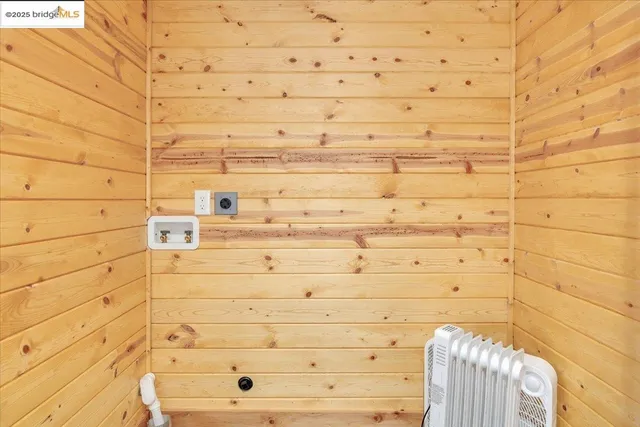 a view of a green field with lots of bushes