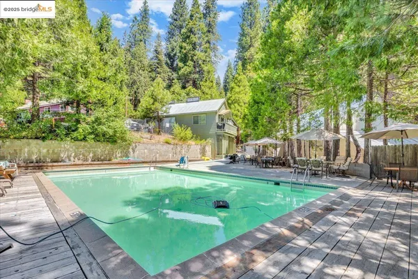 a view of yard with patio