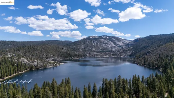 a view of a swimming pool with chairs