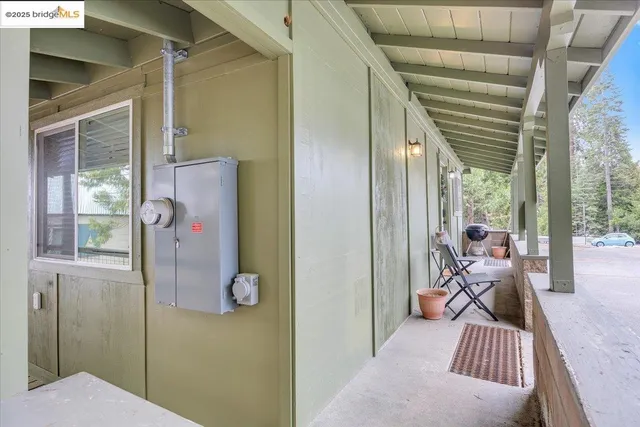 a view of a backyard with sitting area and furniture