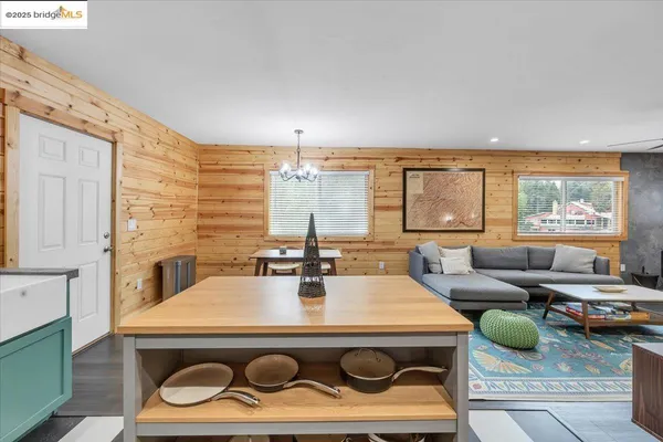 a spacious bathroom with a double vanity sink a mirror and a shower