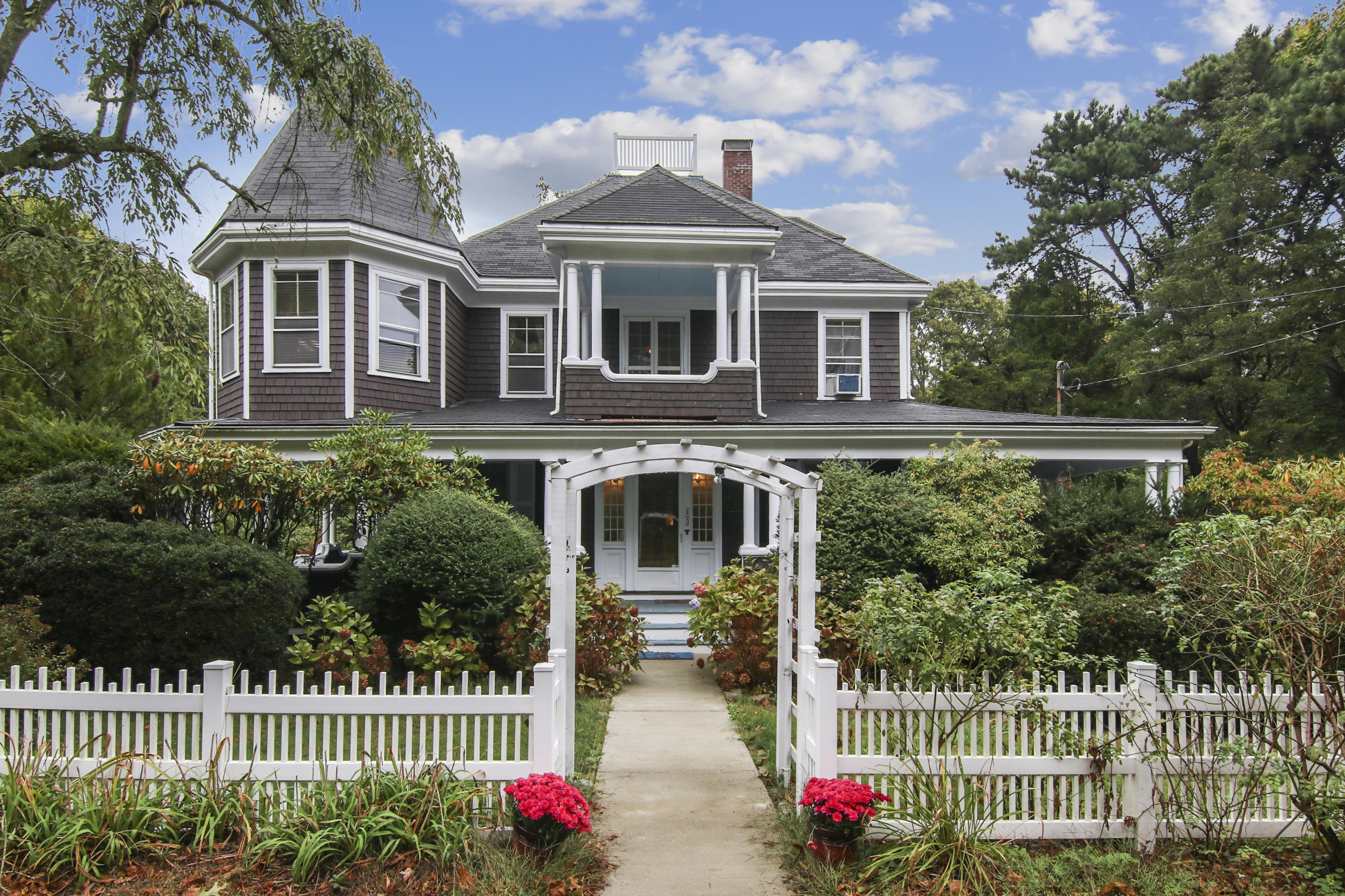 40 Red Brook Harbor Road Pocasset, MA 02559 - Photo 1 of 30 a front view of a house with balcony