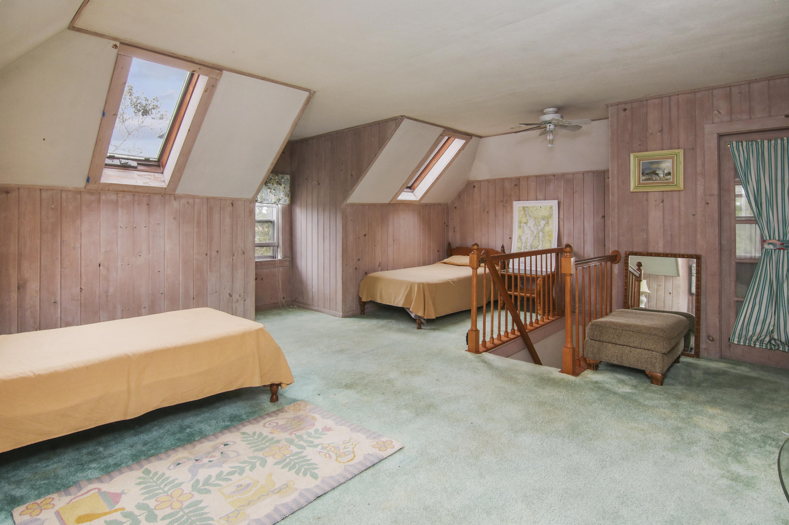 40 Red Brook Harbor Road Pocasset, MA 02559 - Photo 25 of 30 a bedroom with a bed and a couch