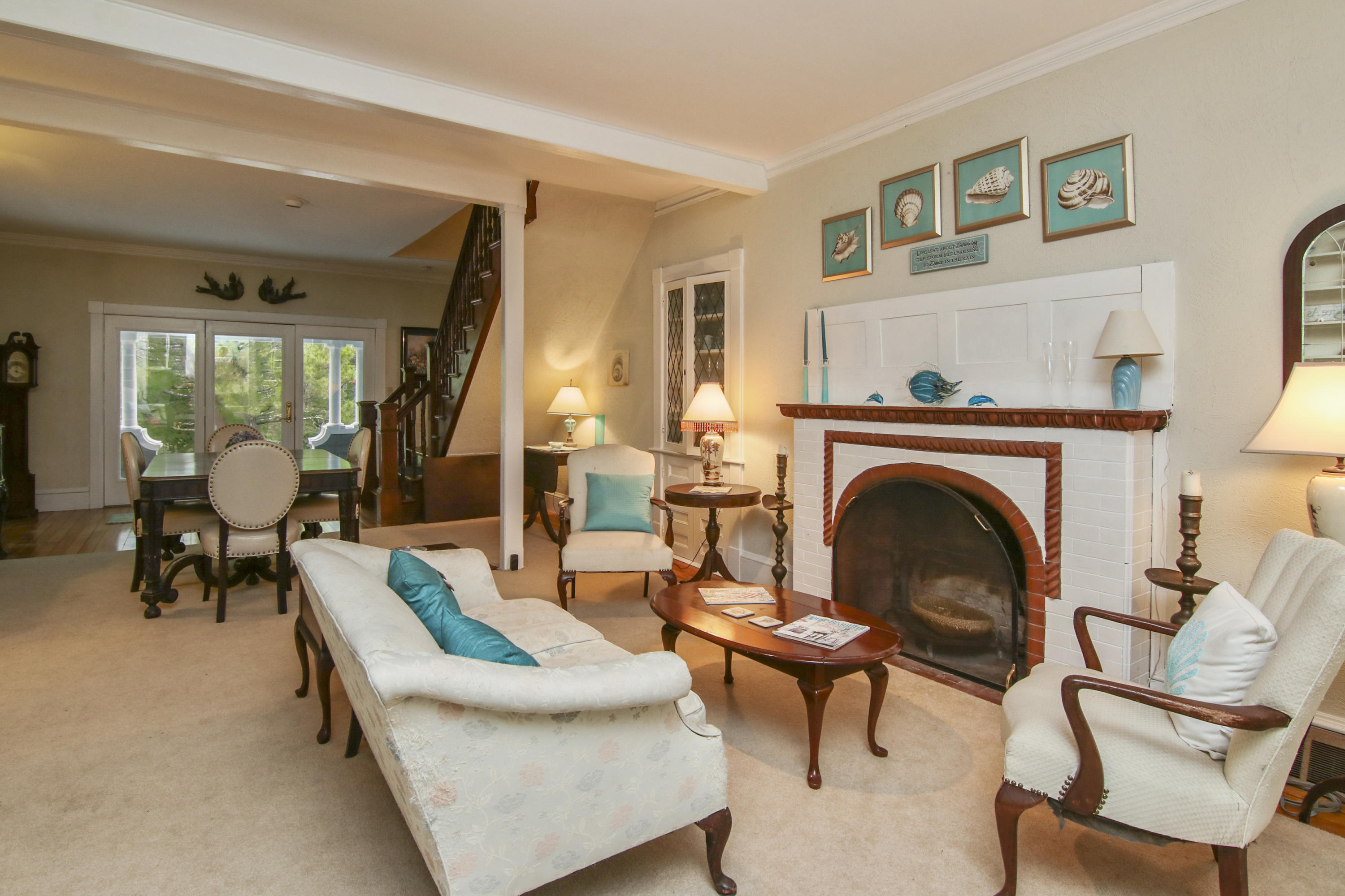 40 Red Brook Harbor Road Pocasset, MA 02559 - Photo 4 of 30 a living room with furniture and a fireplace