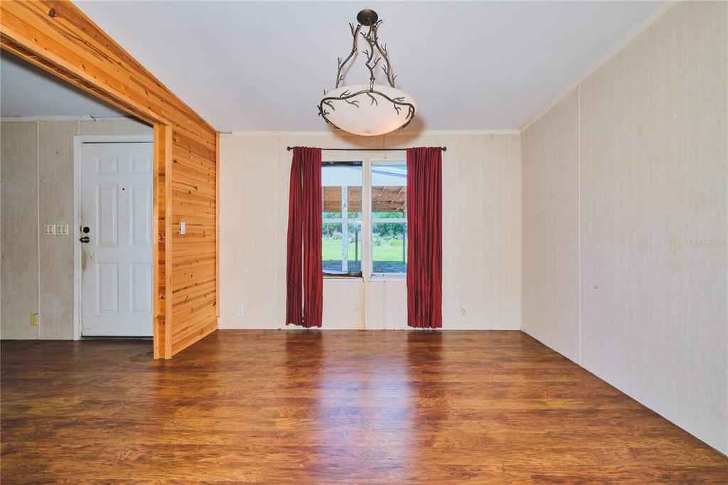 2701 Murphy Road Ona, FL 33865 - Photo 12 of 41 a view of empty room with wooden floor and fan