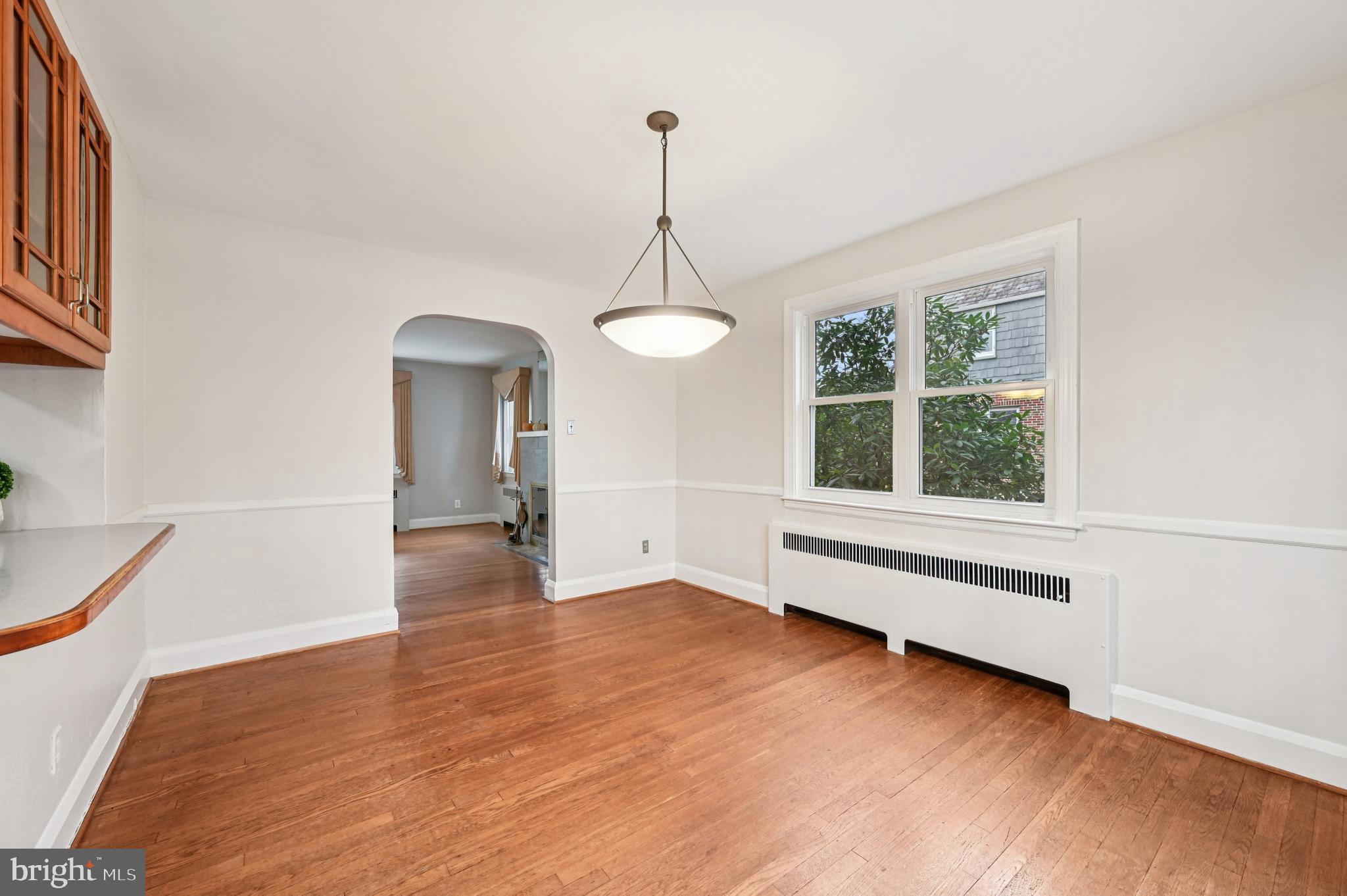 19 Somerset Road Baltimore, MD 21228 - Photo 11 of 39 a view of empty room with wooden floor and fan
