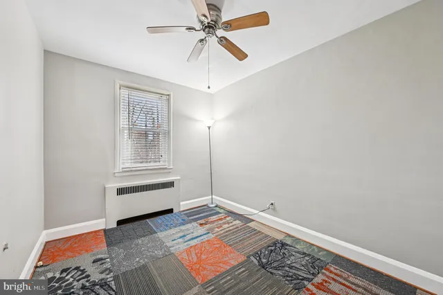 a view of an empty room and window