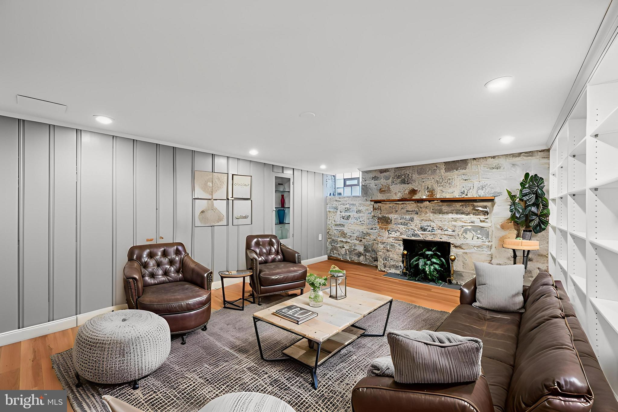 19 Somerset Road Baltimore, MD 21228 - Photo 24 of 39 a living room with furniture and a fireplace