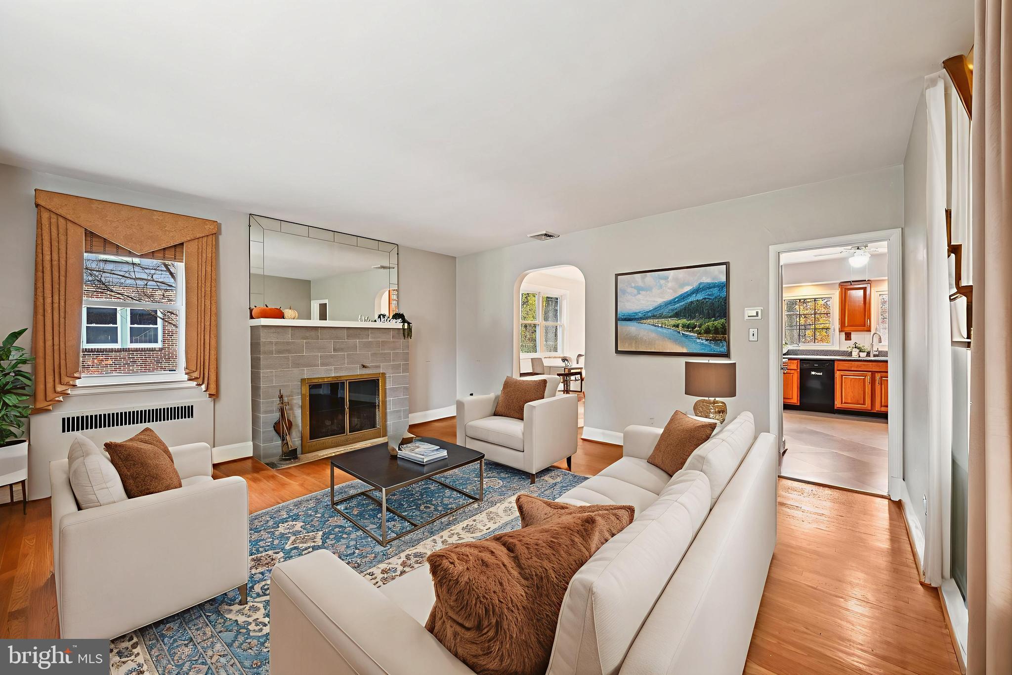19 Somerset Road Baltimore, MD 21228 - Photo 3 of 39 a living room with furniture and a fireplace