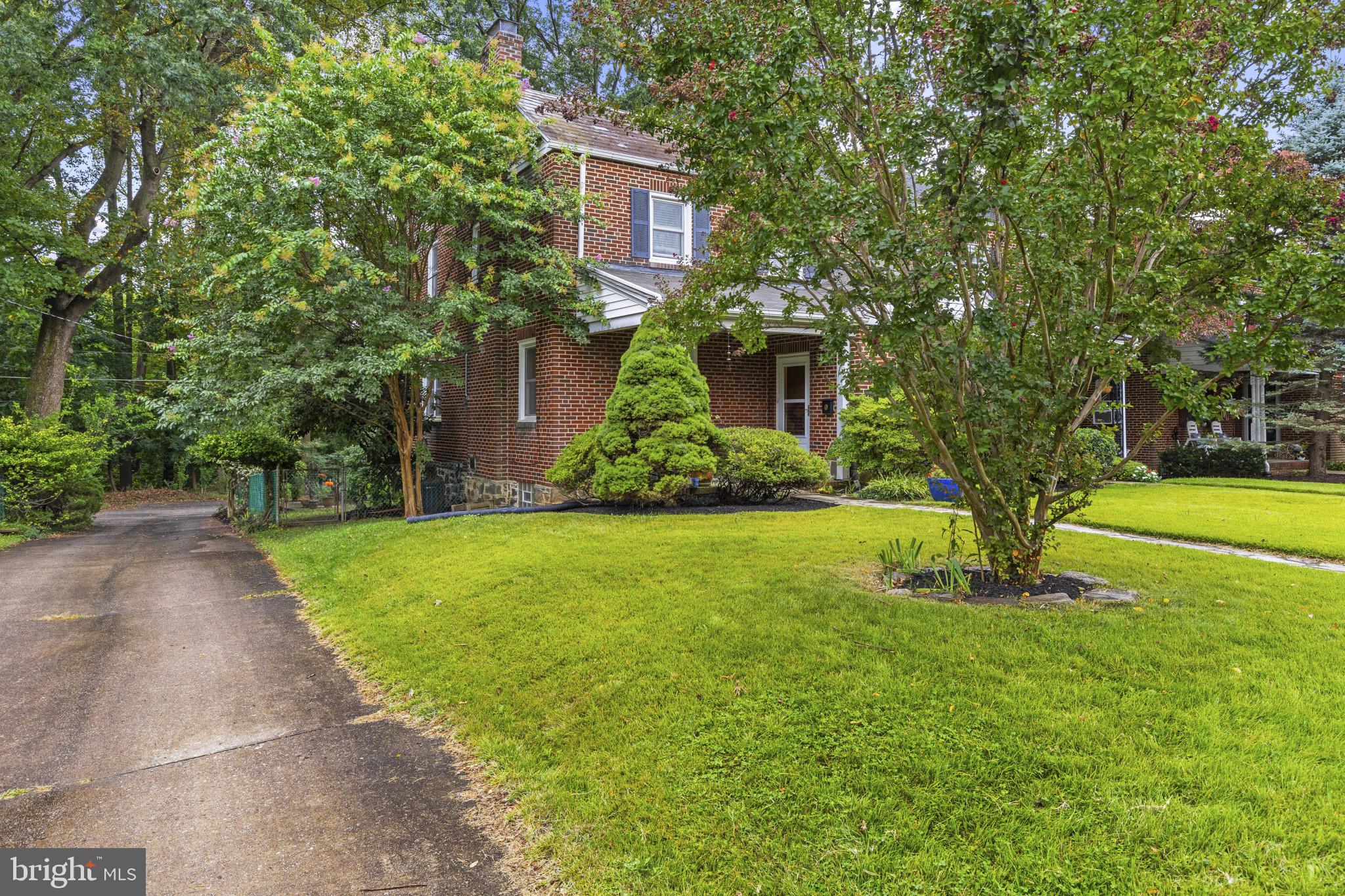 19 Somerset Road Baltimore, MD 21228 - Photo 33 of 39 a view of a house with garden and trees