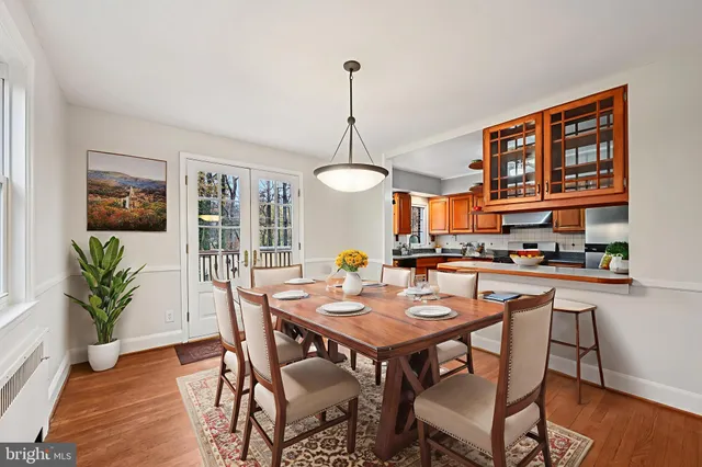 a view of kitchen with furniture wooden floor and window