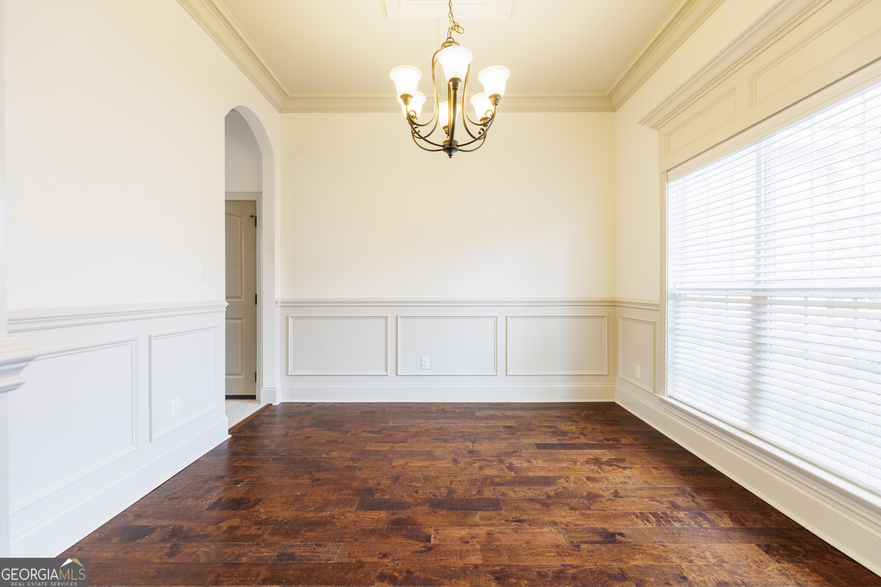 5109 Village Way Hahira, GA 31632 - Photo 17 of 42 a view of empty room with wooden floor and fan